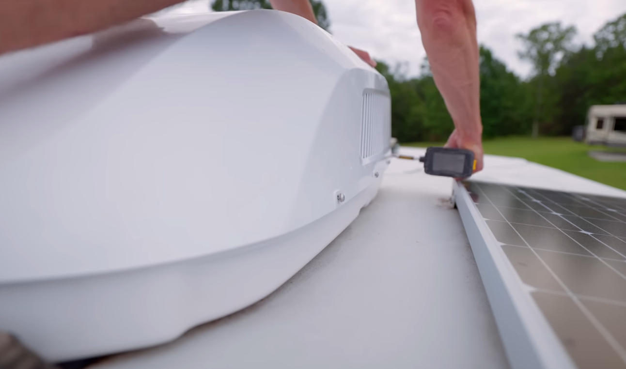 RV AC capacitor being tested and replaced by mobile technician in Stuart Florida